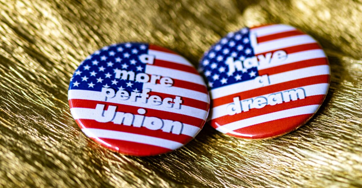 Two buttons that say i have a period of union
