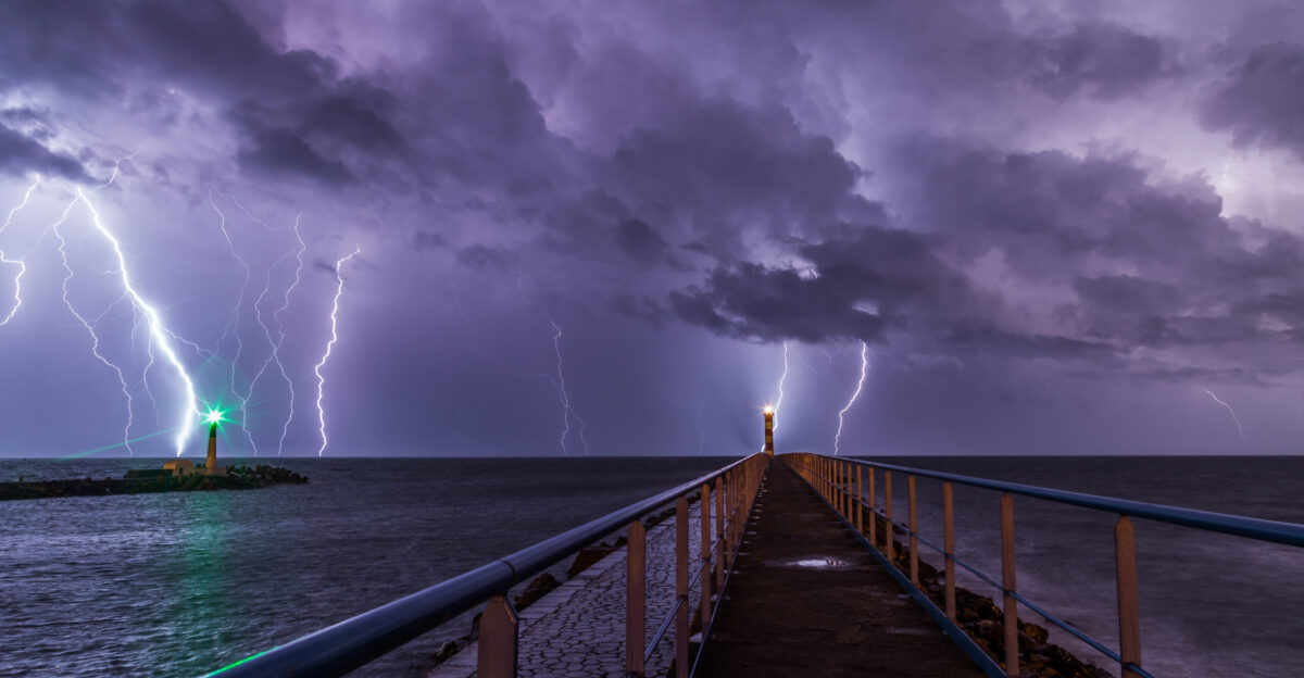 Port and lighthouse overnight storm with lightning in Port-la-Nouvelle in the Aude department in southern France
