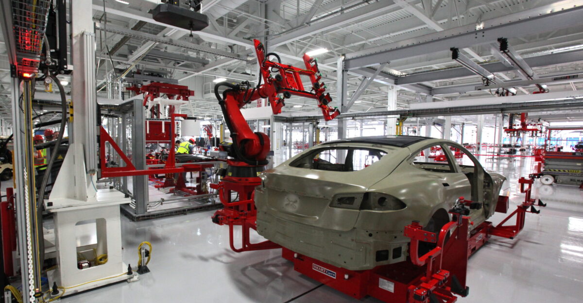 a factory tour after the Model S drive on the track This one installs the laminated glass roof It s amazing how much brighter the factory looks after the floor has been epoxied white just like they have at SpaceX and Ironman