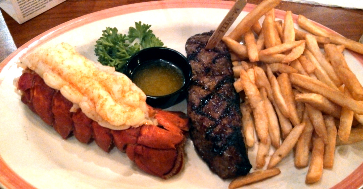Steak and lobster with fries from restaurant chain Sizzler.